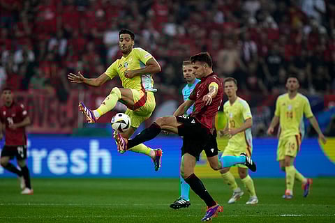Mikel Merino tussles for the ball with Berat Djimsiti
